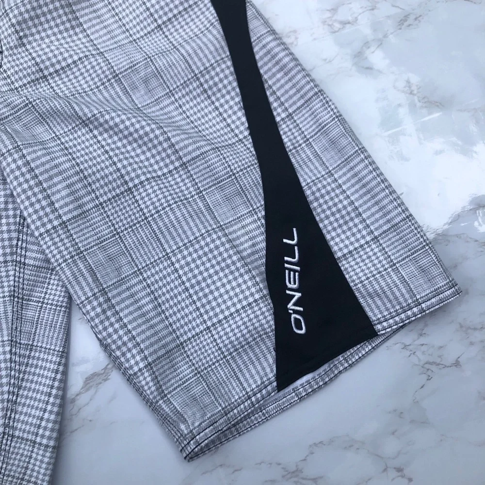 O’neill black and plaid men’s swim board shorts size 28